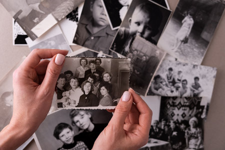 BAKU, AZERBAIJAN-June 18, 2024. Printed vintage antique black and white retro photos. Memories and nostalgiaのeditorial素材