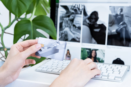 online shopping. Choosing clothes and shoes from home. Shopping from homeの写真素材