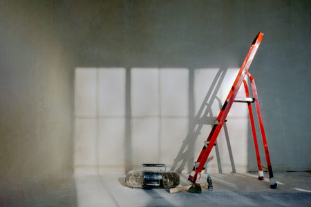 Old tape recorder, with paint for workers, music and radio. renovation, repair concept. ladder