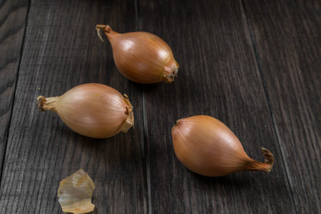Fresh bulb onions  on the table.