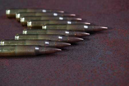 Group of  ammunition on a rusted metal background selective focusの写真素材