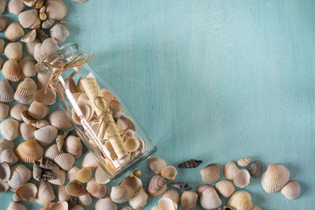 Bottle with a message, seashells. Marine concept. Memories about vacationの写真素材