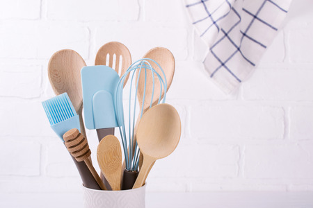 Set of kitchen utensils, wooden and silicone, free copy space . Close upの写真素材