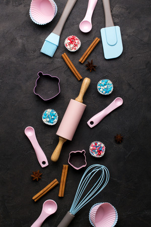 It's cooking time. Baking tools on dark. Recipe book background concept.の写真素材