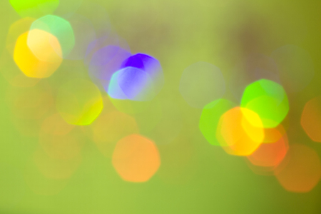 Abstract glitter sparkle bokeh defocused on green background. Spring moodの写真素材