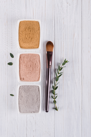 Beauty concept. Flat lay, Different clay mud powders natural ingredients for homemade facial and body mask or scrubの写真素材
