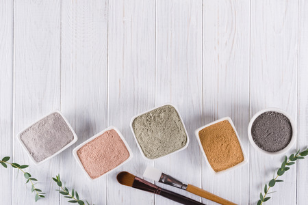 Beauty concept. Flat lay, Different clay mud powders natural ingredients for homemade facial and body mask or scrubの写真素材