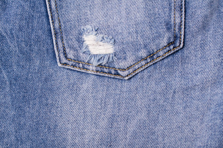 Close up of  blue jeans pocket. Blue jeans texture. fashion design