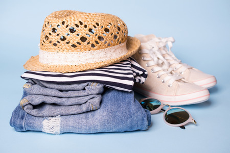 Stack of ladies summer clothes  and accessories.の写真素材
