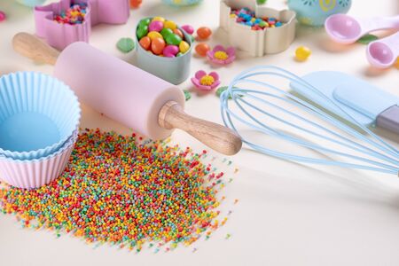 Baking and cooking concept. Cookie cutters, whisk, roller pin and kitchen bake tools for making sweets.の写真素材