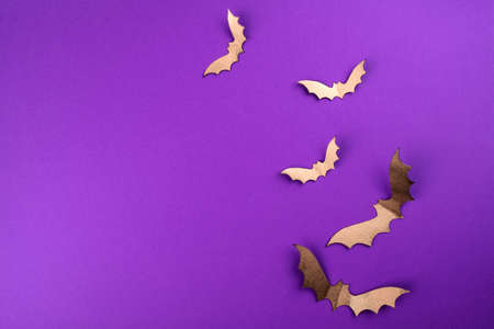 Halloween mock up concept. Flying black paper bats on purple backgroundの写真素材