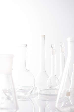 Background for branding and product presentation. Empty chemical, biological science laboratory glassware collection.の写真素材