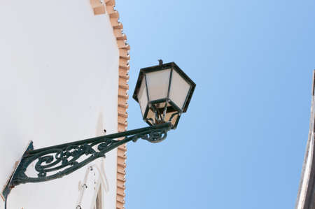 Old street lantern in Portugalの写真素材