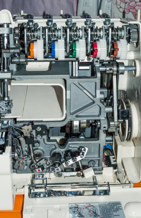 Dirty internal details of coverlock Merrylock 5550A and their cleaning. Repair and production of household sewing machinesの写真素材