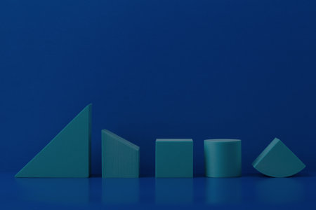 Abstract still life with blue geometric figures on blue background wit space for text. Sample for advertising or bannerの写真素材