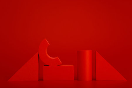 Red abstract monochromatic background with geometrical figures and space for text