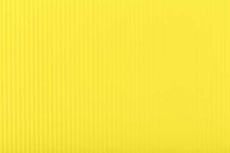 Yellow background with stripes and copy space.の写真素材