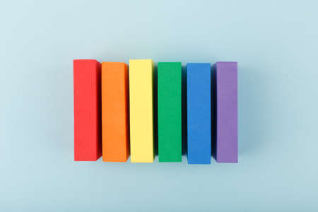 Minimal creative Lgbtq plus concept against pastel blue backgroundの写真素材
