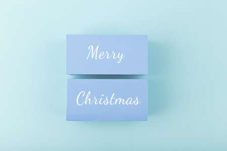 Merry Christmas minimal modern concept in light pastel blue colorsの写真素材
