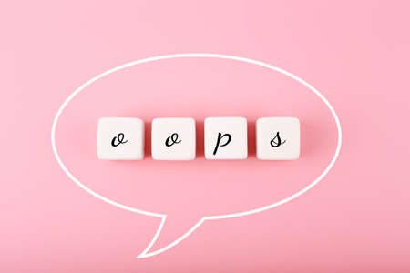 Speech bubble oops on bright pink background. Bright, minimal, modern concept of emotions expressionの写真素材