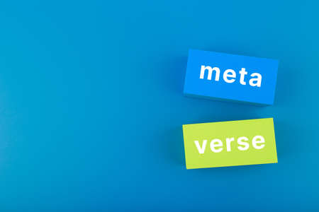 Meta verse modern minimal concept in blue colors. Written metaverse single word on two pink rectangles against dark blue background. Future computer technologies.の写真素材