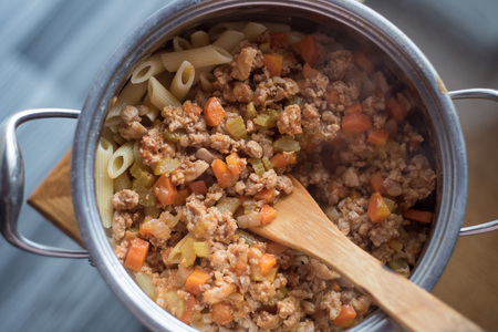Preparation of pasta Bologneseの写真素材