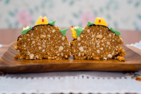 Plate with delicious chocolate cake on wooden tray