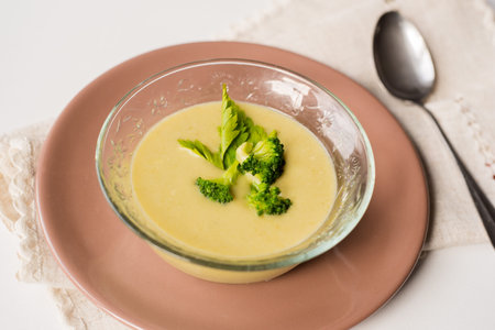 Cream of broccoli soup in a plateの写真素材