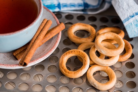 Bakery food, dessert, A cup of tea with bread, bagels, Russian tradition, spring breakfast Vintazhny background tray on the tableの写真素材