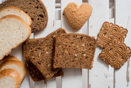 set of traditional bread, on an antique wooden white background.