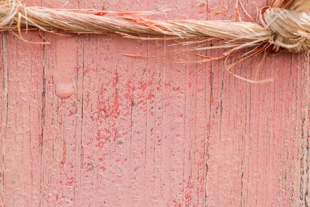 Wooden background. Old shabby pink colored wooden fenceの写真素材