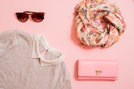 Fashion lady accessories set. Falt Lay. Stylish handbag. Make-Up brushes. Summer sunglasses. Jewelry and nail polish. Women accessories. Trendy fashion design. Flat lay, top view. Copy spaceの写真素材