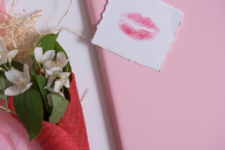 Mockup with postcard and jasmine on pink background. card and white flowers. waffle for ice cream, lip kissの写真素材