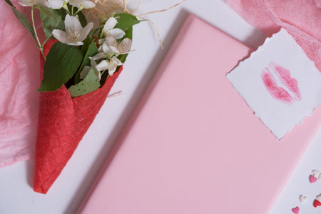 Mockup with postcard and jasmine on pink background. card and white flowers. waffle for ice cream,...