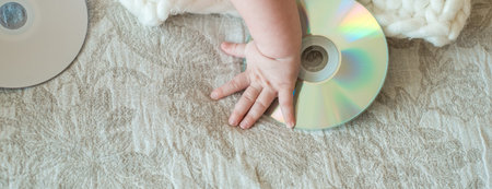 Long banner. Little DJ. Little Baby, CD drive, takes a hand on the bed