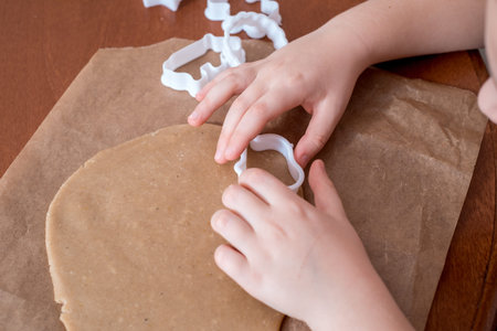A rendered dough with baking molds.
