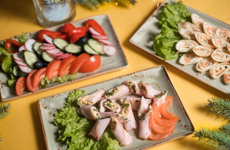 Traditional New Years salad Russian and Ukrainian - Russian salad on the festive tableの写真素材