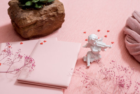 Preparations for Valentines Day: a notebook for congratulation or sweet notes, chocolate candies,...