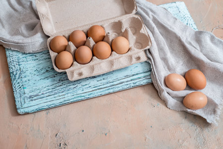 Easter on wooden blue background with Easter eggs .Top view with copy space