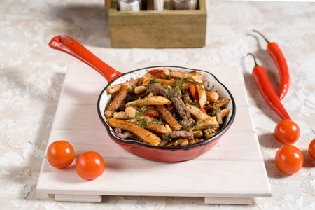 French fries On the griddle. National Belarusian or Russian dish.