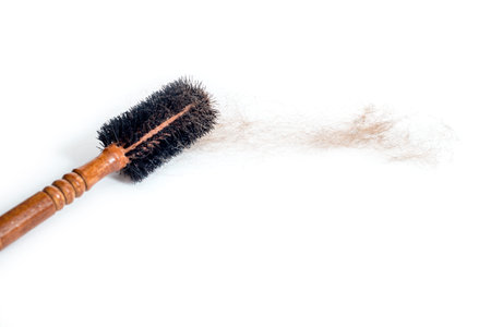 Avitaminosis in women. Hair loss. comb with loose hair. Scalp treatment. Hair care concept. copy...