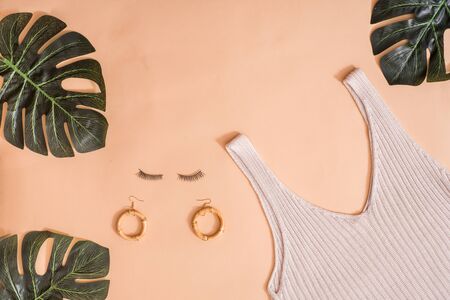 Flat lay woman shirt and accessoriesの写真素材