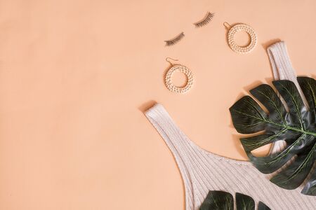 Flat lay woman beauty concept with exotic green leaf of palm tree.の写真素材