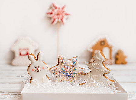 Christmas homemade gingerbread cookies on wooden tableの写真素材
