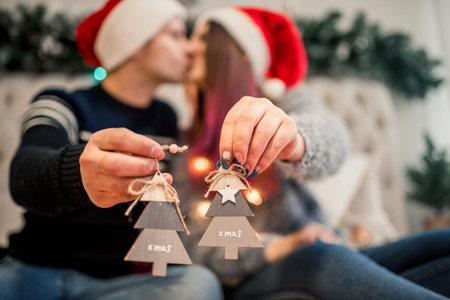 Couple Wrapping Christmas Gifts At Home.Christmas craft boxの写真素材