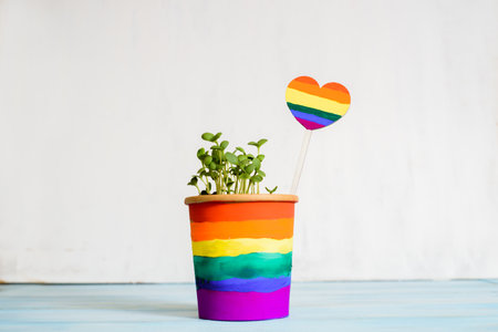 Multi colored drawing by paints. potted rainbow, young sprouts, colorful flower.Multi-colored drawing by paints. bright card.Equality betwee. LGBT concept. lesbian gay , bisexual transsexualの写真素材