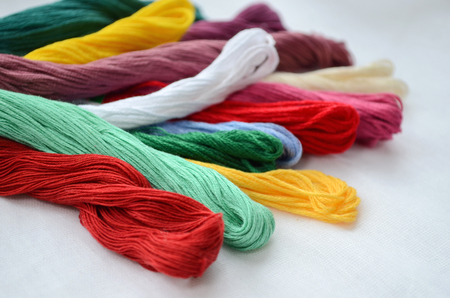 Set of colorful threads in a warm colors, for embroidery and sewingの写真素材