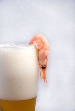 goblet with cool beer and prawnの写真素材