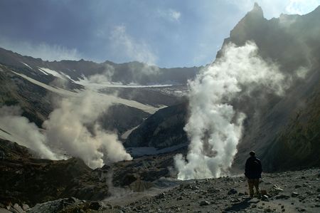 Man goes inwardly crater of the vulcanの写真素材