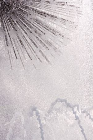 Splash of fountain in a urban parkの写真素材